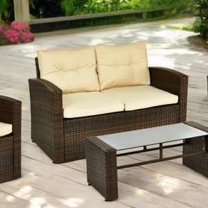 Four Piece Outdoor Brown Wicker Sofa Seating Group with Beige Cushions