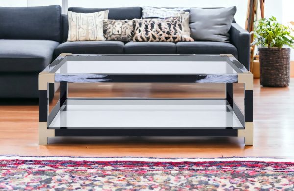 54" Clear And Black and White Glass And Metal Coffee Table With Shelf - Image 2