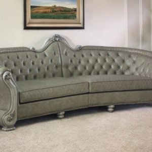 113" Bone Faux Leather Sofa And Toss Pillows With White Legs